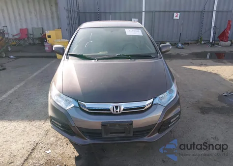 2013 Honda Insight Ex z USA, uszkodzony, nr VIN JHMZE2H74DS006320